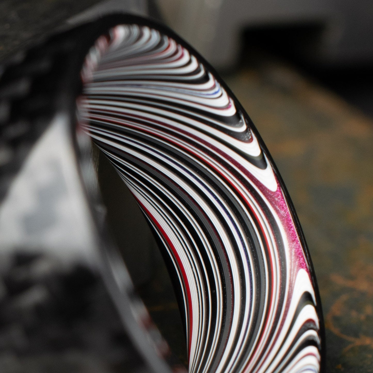1k Twill Carbon Fiber Ring Lined With Tilted Fordite. Gloss Finish Carbon Fiber
