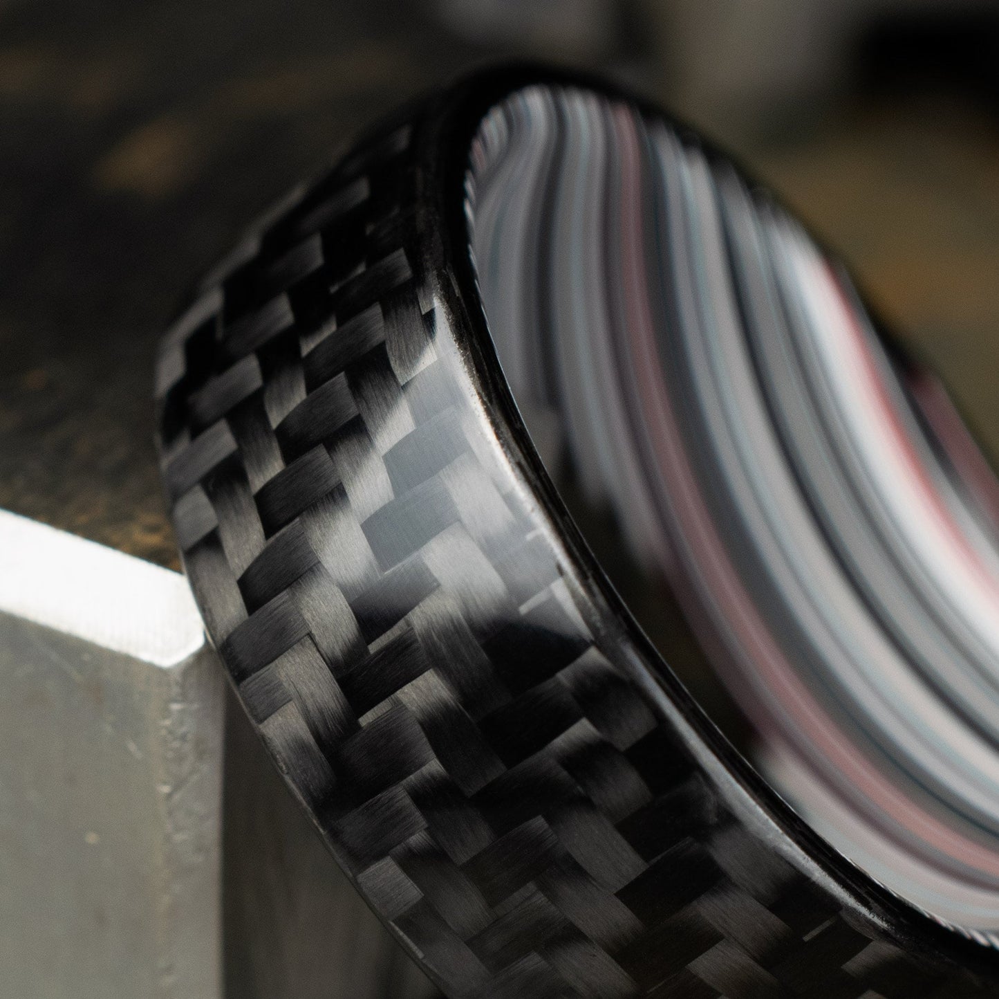1k Twill Carbon Fiber Ring Lined With Tilted Fordite. Gloss Finish Carbon Fiber