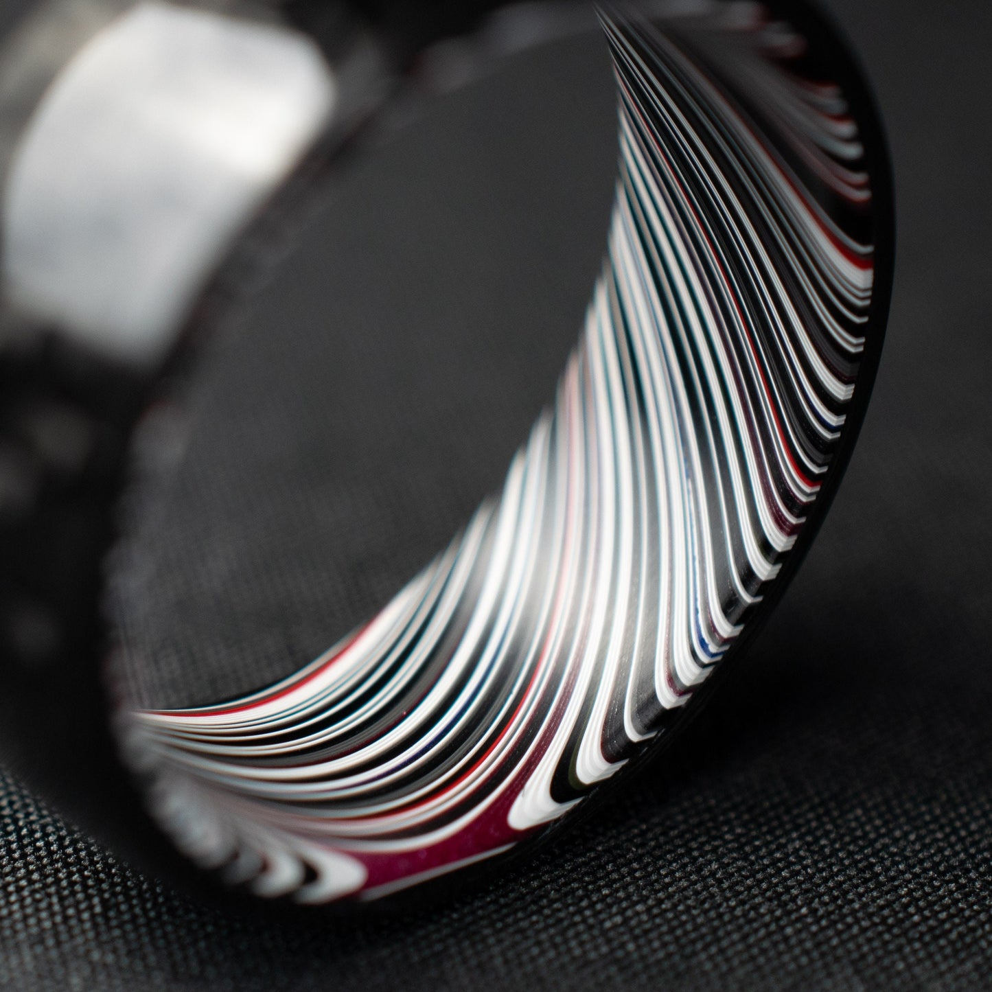1k Twill Carbon Fiber Ring Lined With Tilted Fordite. Gloss Finish Carbon Fiber
