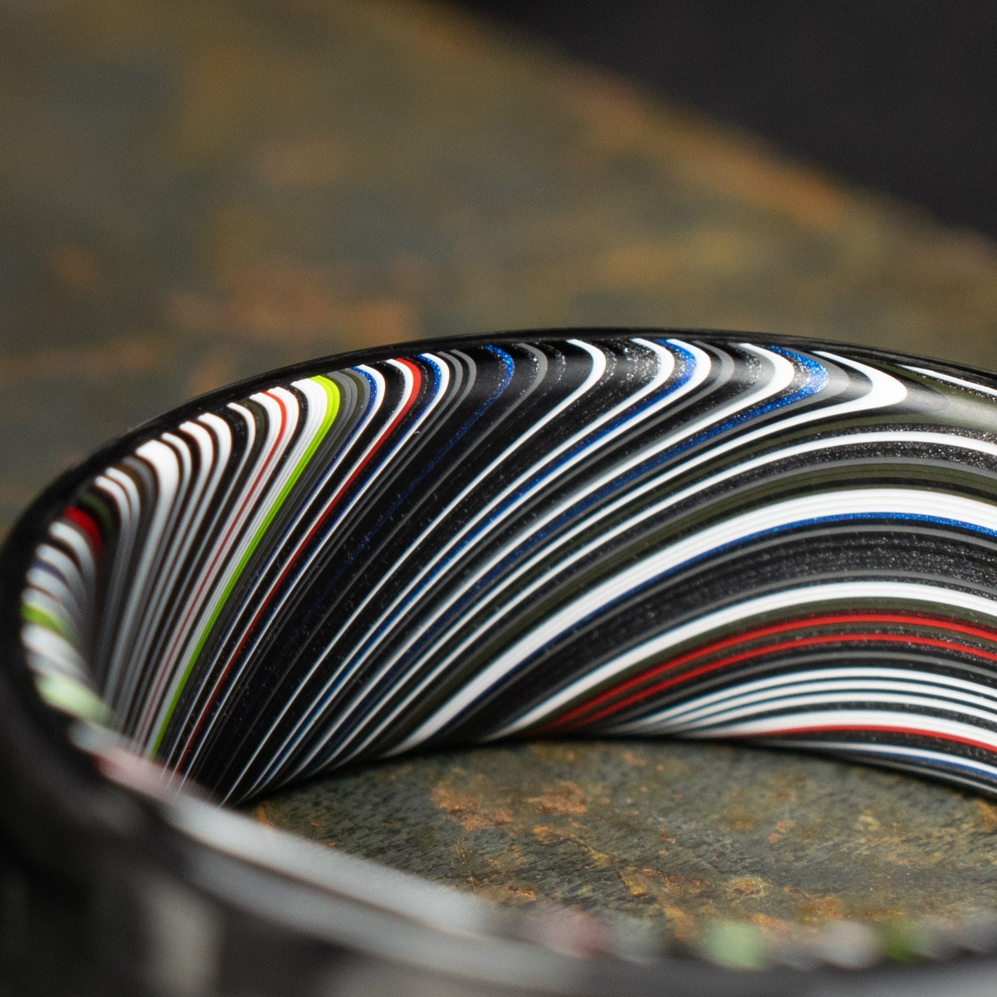 5HS Carbon Fiber Ring Lined With Tilted Premium Fordite