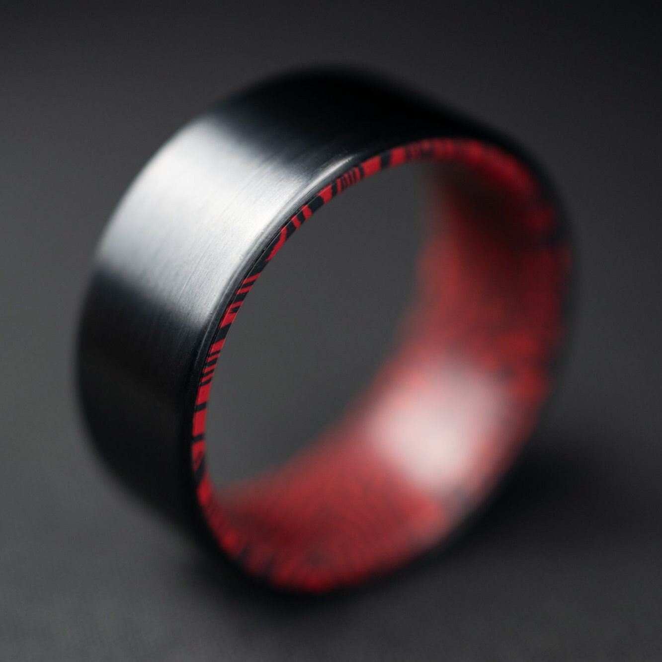 Black Titanium Ring Lined With Black and Red Mosaic Spectrum Damascus, Brushed Finish Black Titanium