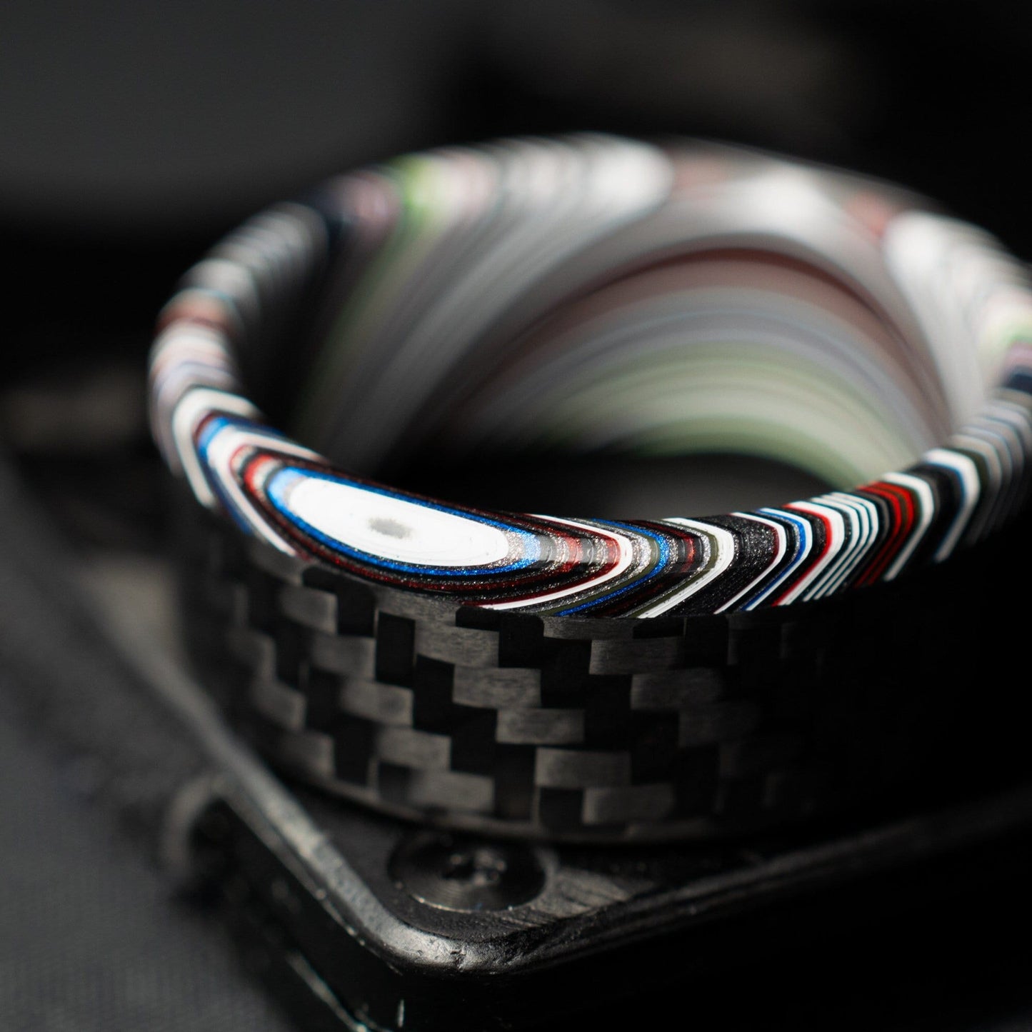 1k Twill Carbon Fiber Ring Lined With Tilted Premium Fordite In a Flipped Cuff Design