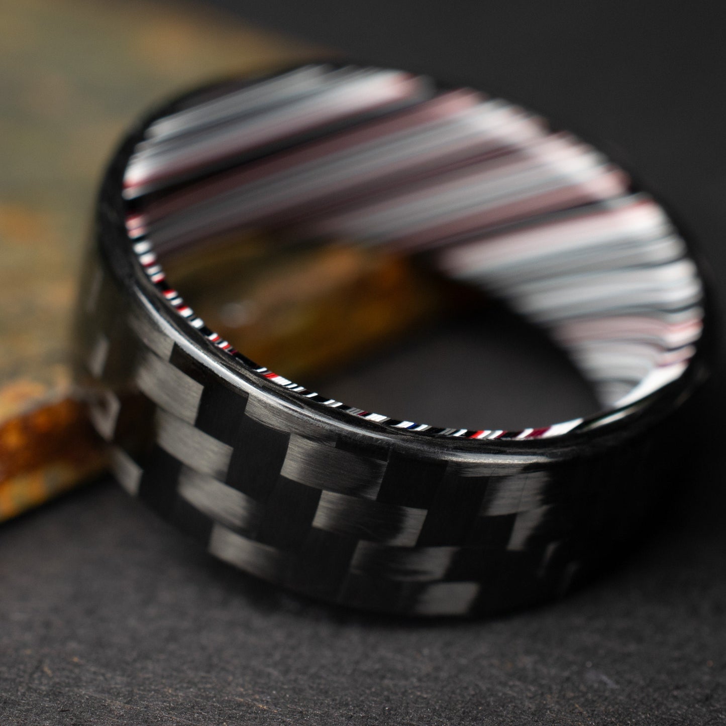 3k Twill Carbon Fiber Ring Lined With Tilted Fordite. Gloss Finish Carbon Fiber