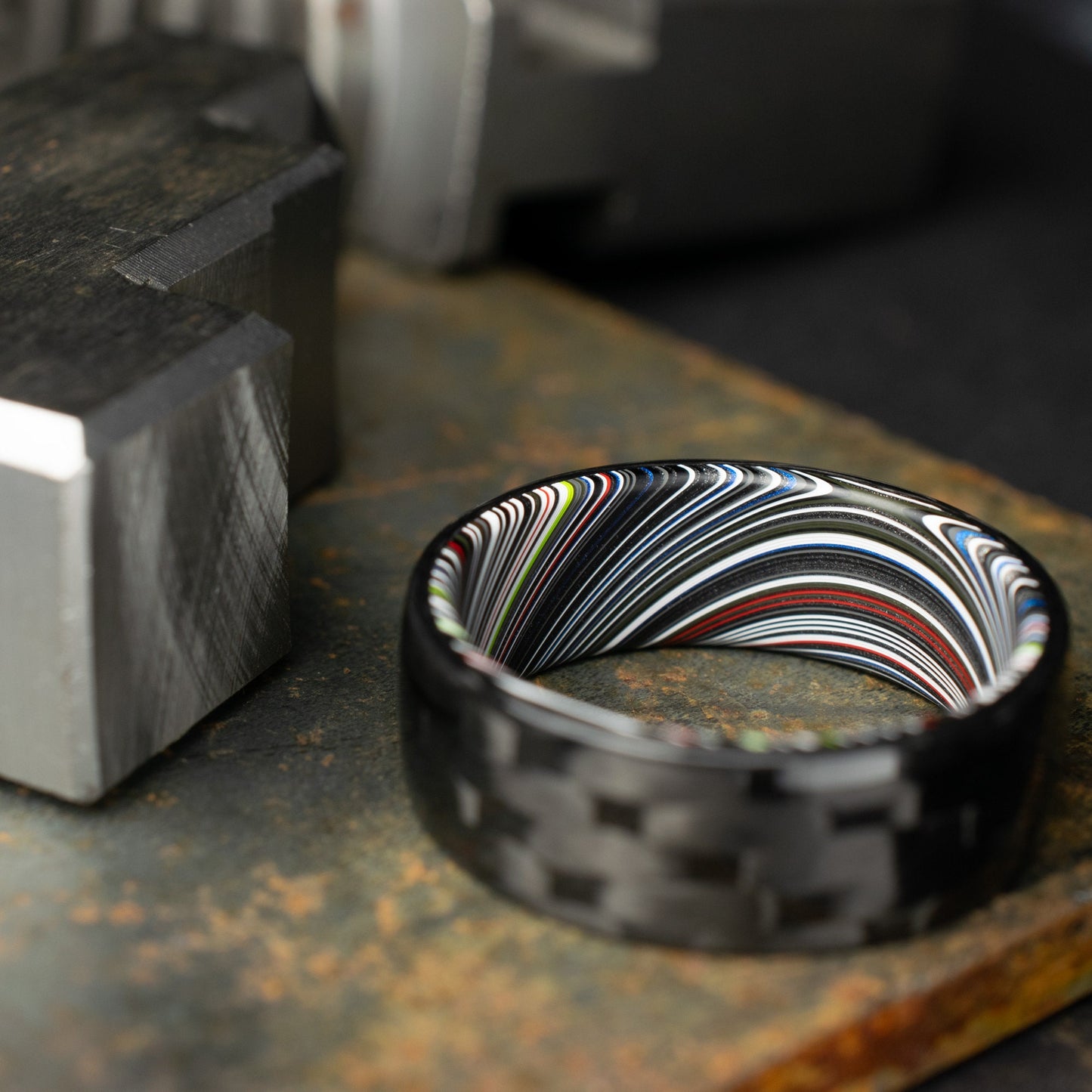 5HS Carbon Fiber Ring Lined With Tilted Premium Fordite