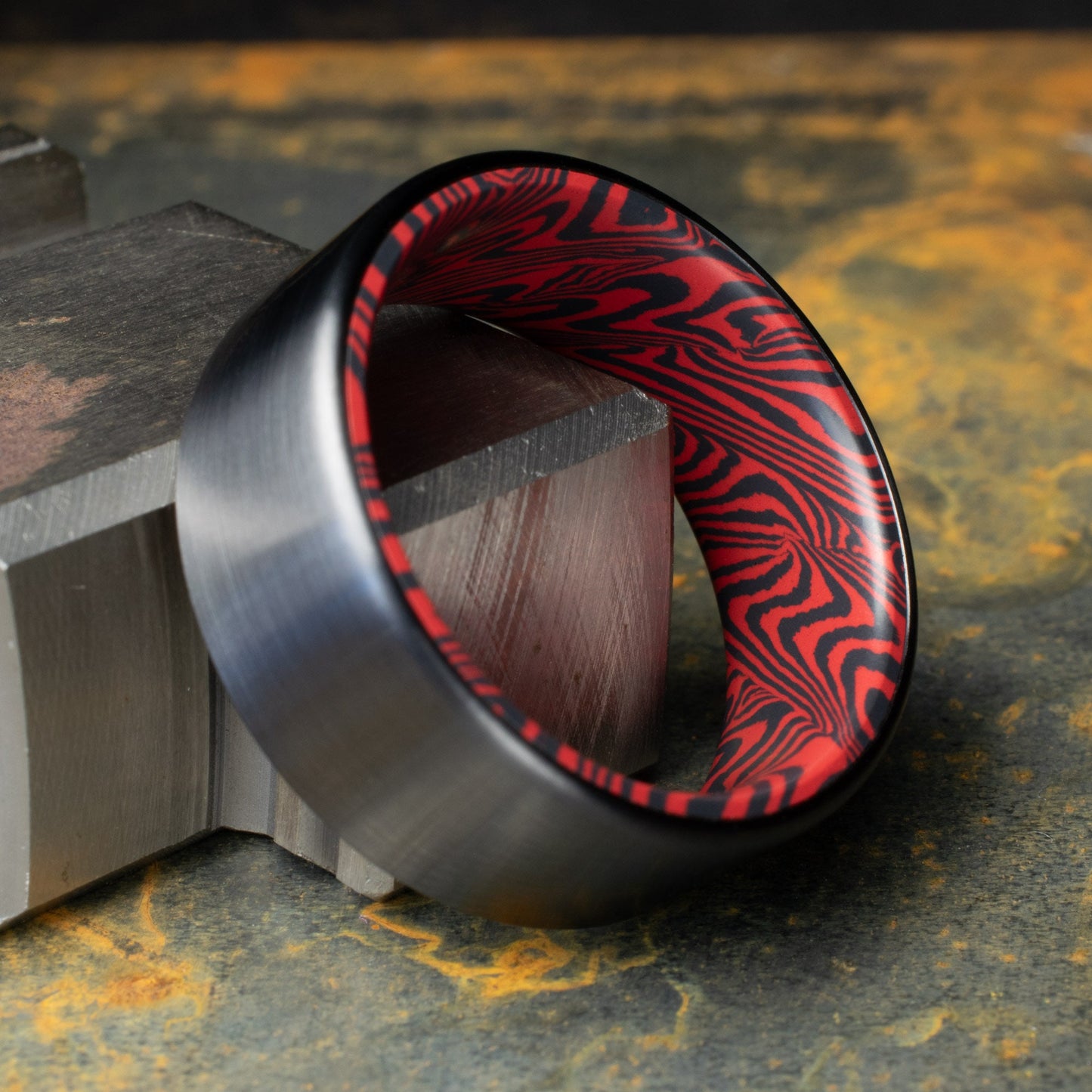 Black Titanium Ring Lined With Black and Red Mosaic Spectrum Damascus, Brushed Finish Black Titanium