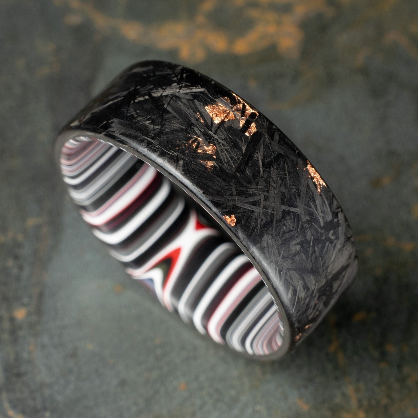 Men's Wedding Band, Copper Chopped Carbon Fiber, Lined With Crosscut Fordite. Matte Finish Carbon Fiber.