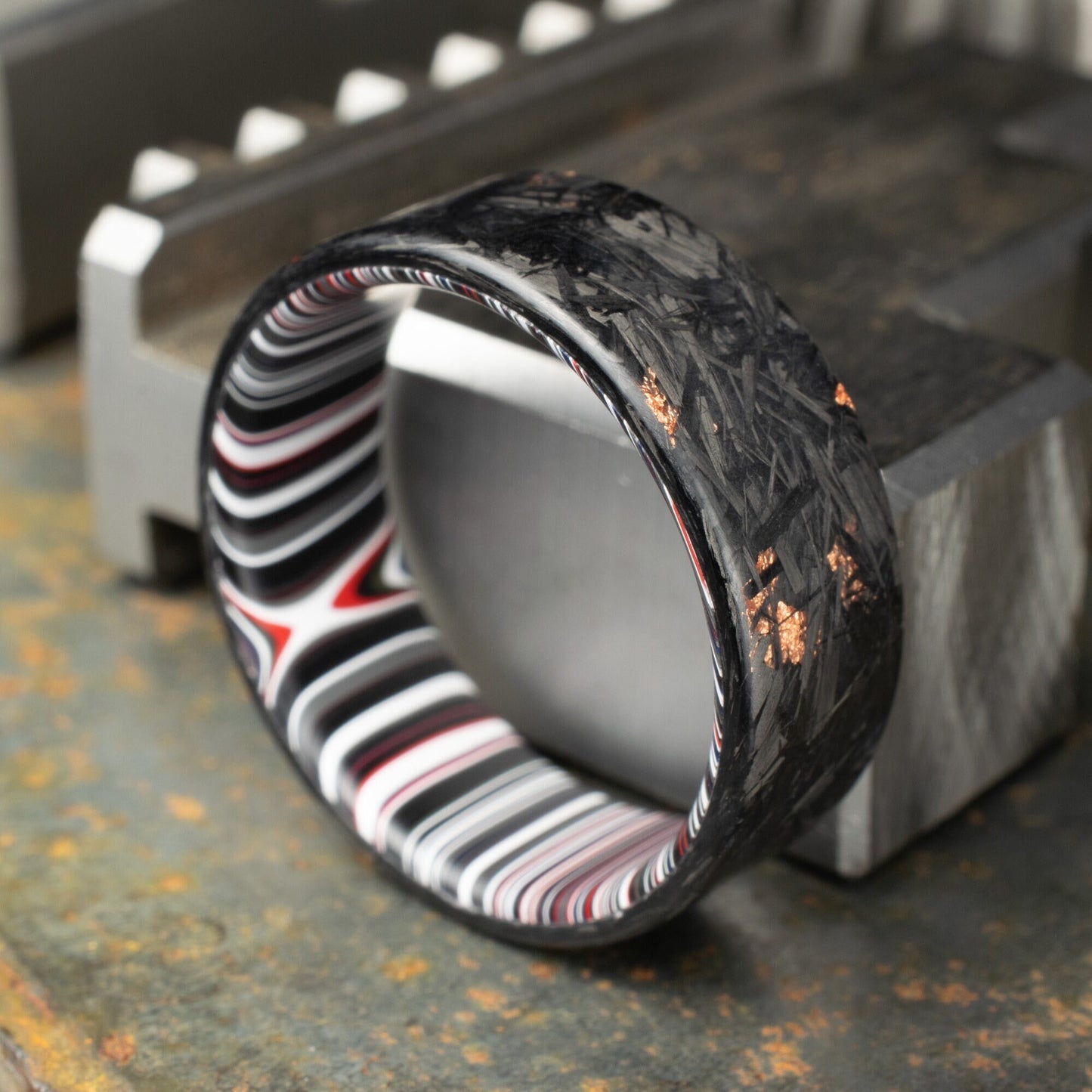 Men's Wedding Band, Copper Chopped Carbon Fiber, Lined With Crosscut Fordite. Matte Finish Carbon Fiber.
