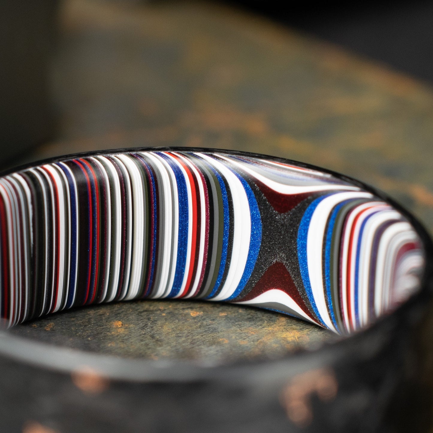 Men's Wedding Band, Copper Chopped Carbon Fiber, Lined With Crosscut Fordite. Matte Finish Carbon Fiber.