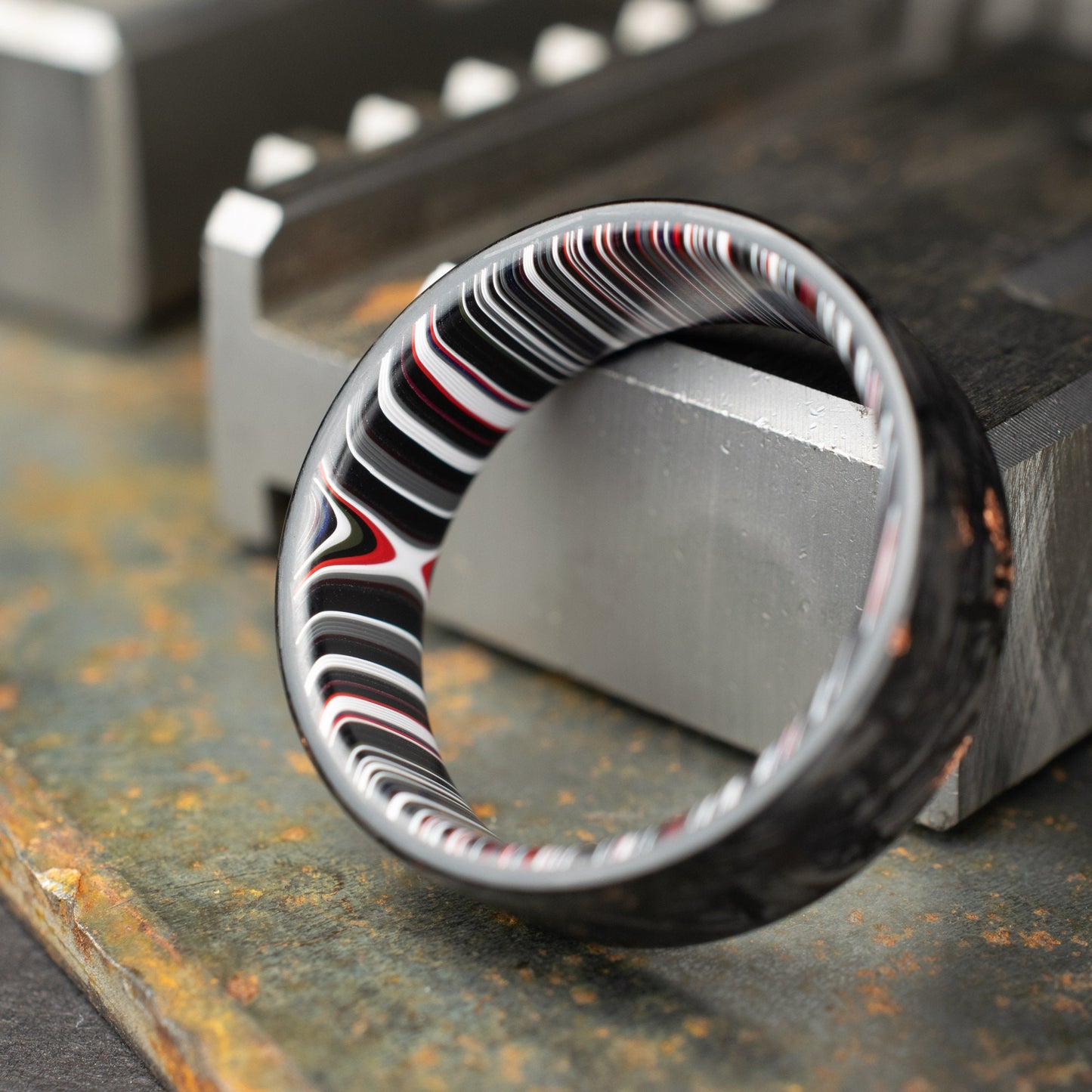 Men's Wedding Band, Copper Chopped Carbon Fiber, Lined With Crosscut Fordite. Matte Finish Carbon Fiber.