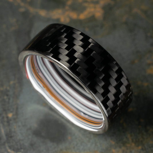 1k Twill Carbon Fiber Ring Lined With Straight Cut Fordite. Gloss Finish Carbon Fiber. Men's Wedding Band.
