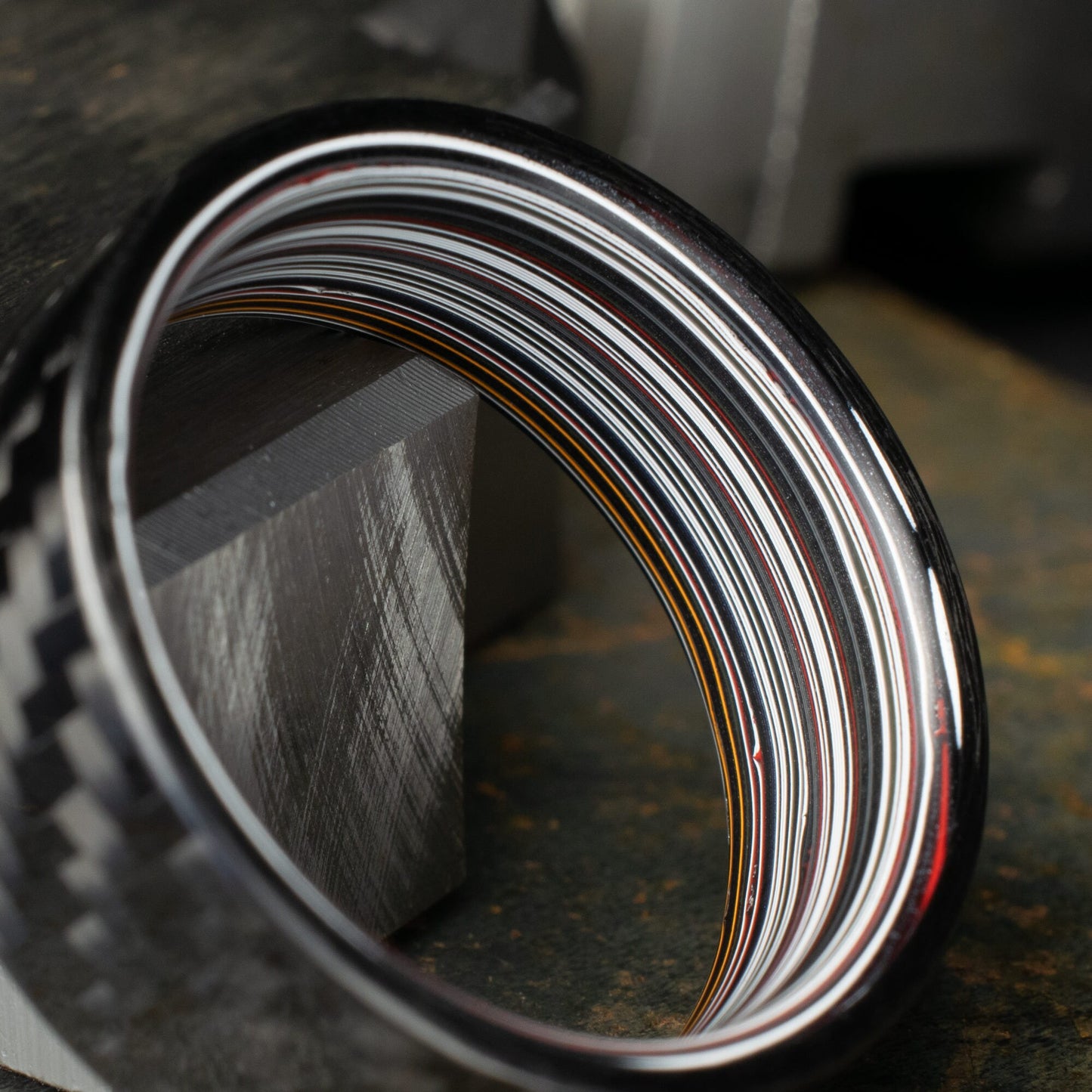 1k Twill Carbon Fiber Ring Lined With Straight Cut Fordite. Gloss Finish Carbon Fiber. Men's Wedding Band.