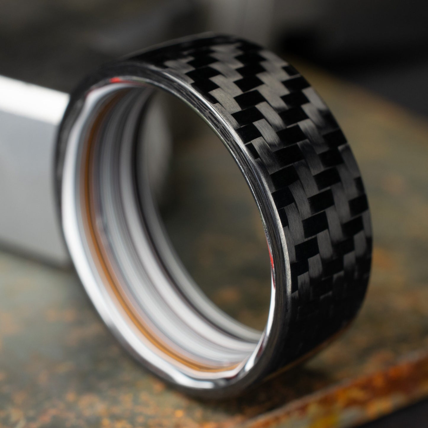 1k Twill Carbon Fiber Ring Lined With Straight Cut Fordite. Gloss Finish Carbon Fiber. Men's Wedding Band.