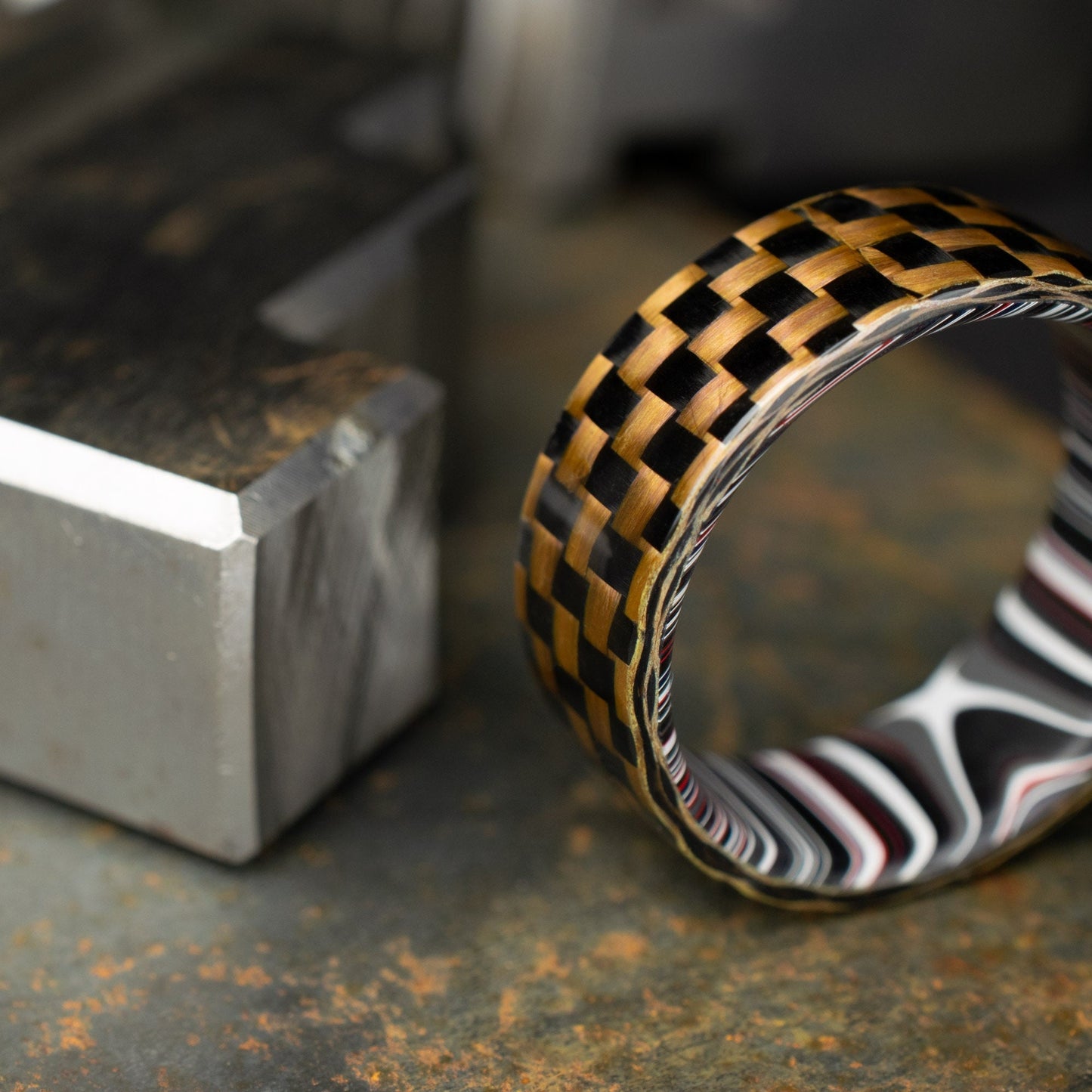 Checkered Zylon/Carbon Fiber Ring Lined With Cross Cut Fordite. Gloss Finish Zylon/Carbon Fiber. Men's Wedding Band.