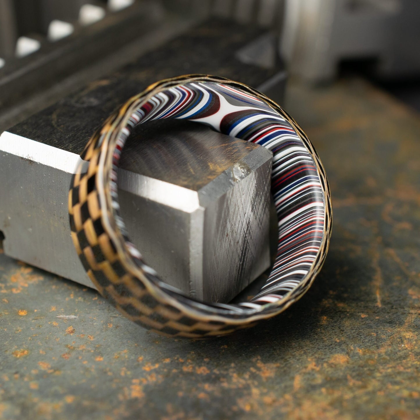 Checkered Zylon/Carbon Fiber Ring Lined With Cross Cut Fordite. Gloss Finish Zylon/Carbon Fiber. Men's Wedding Band.