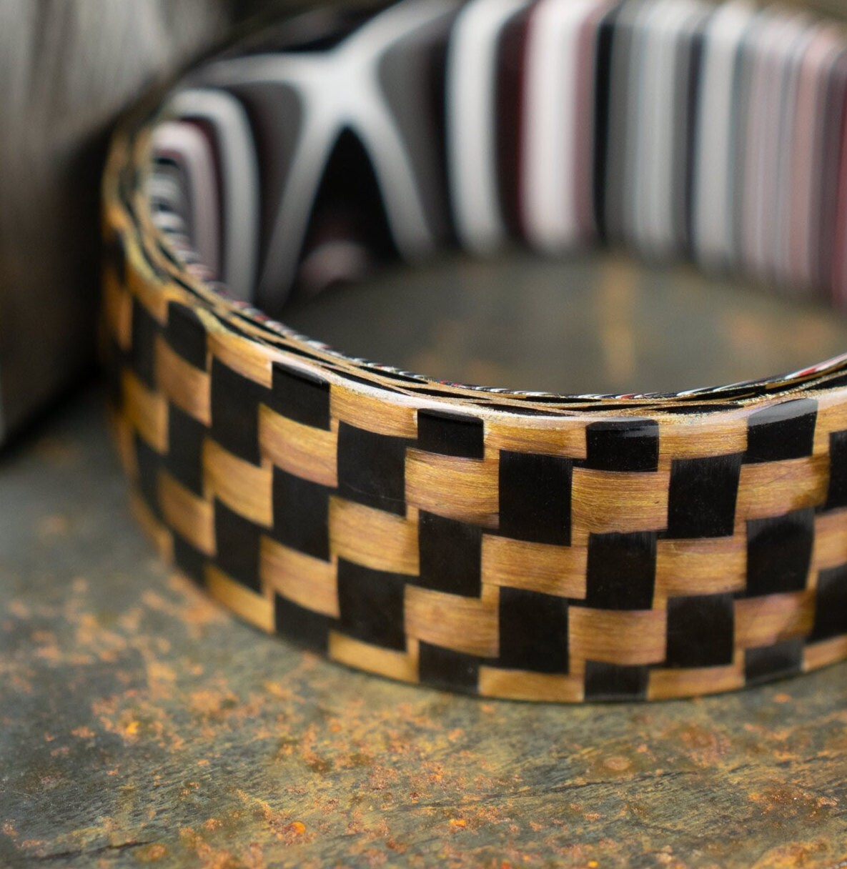 Checkered Zylon/Carbon Fiber Ring Lined With Cross Cut Fordite. Gloss Finish Zylon/Carbon Fiber. Men's Wedding Band.