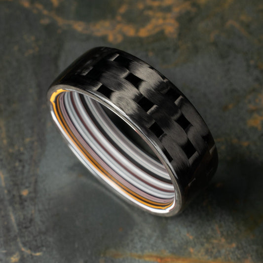 Men's Wedding Band. 5HS Carbon Fiber Ring Lined With Straight Cut Fordite. Gloss Finish Carbon Fiber. Black Ring.