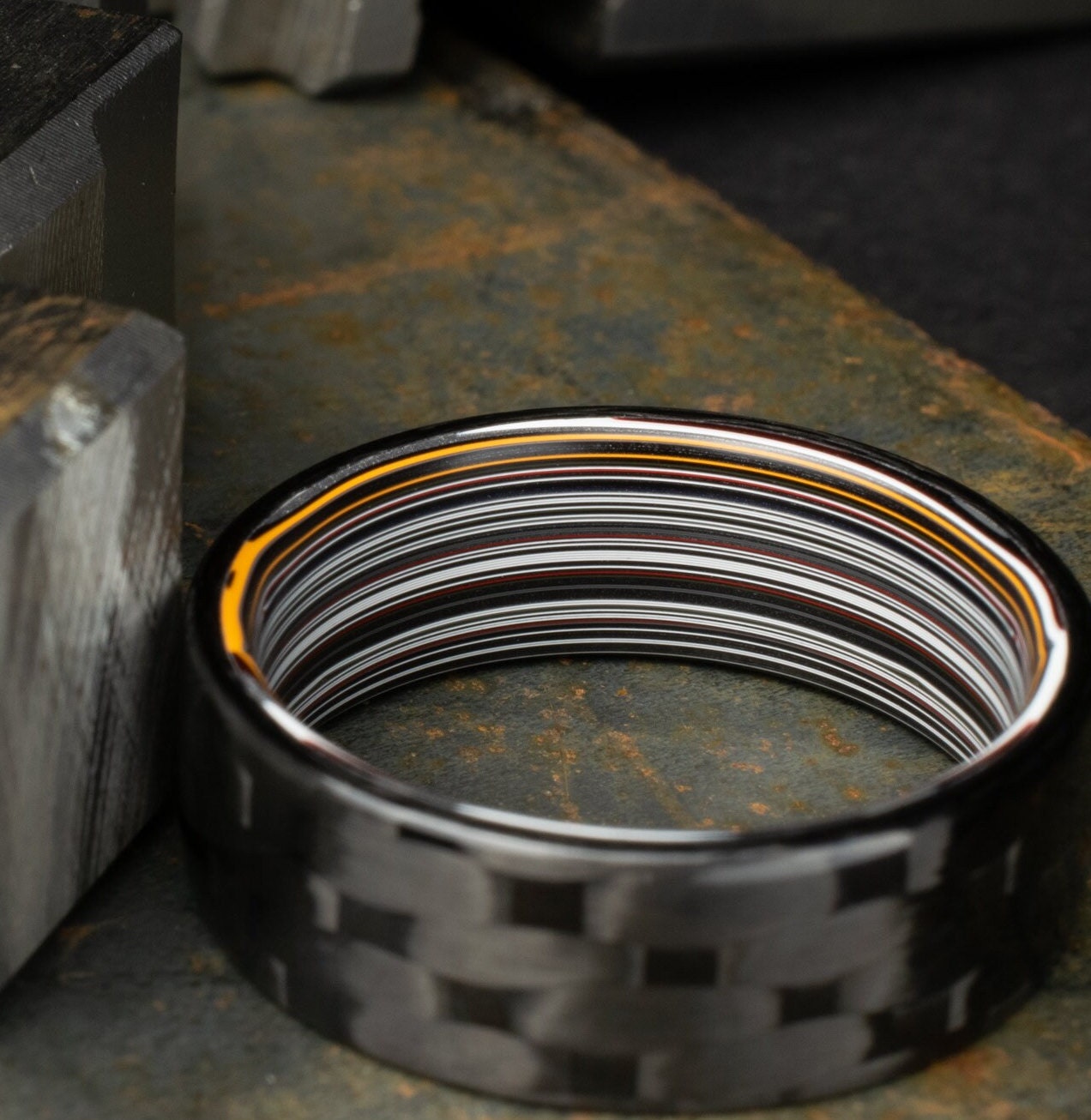 Men's Wedding Band. 5HS Carbon Fiber Ring Lined With Straight Cut Fordite. Gloss Finish Carbon Fiber. Black Ring.