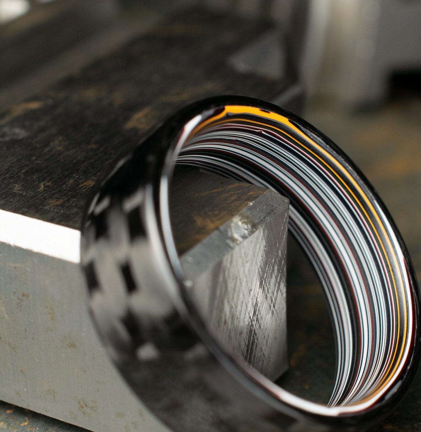 Men's Wedding Band. 5HS Carbon Fiber Ring Lined With Straight Cut Fordite. Gloss Finish Carbon Fiber. Black Ring.