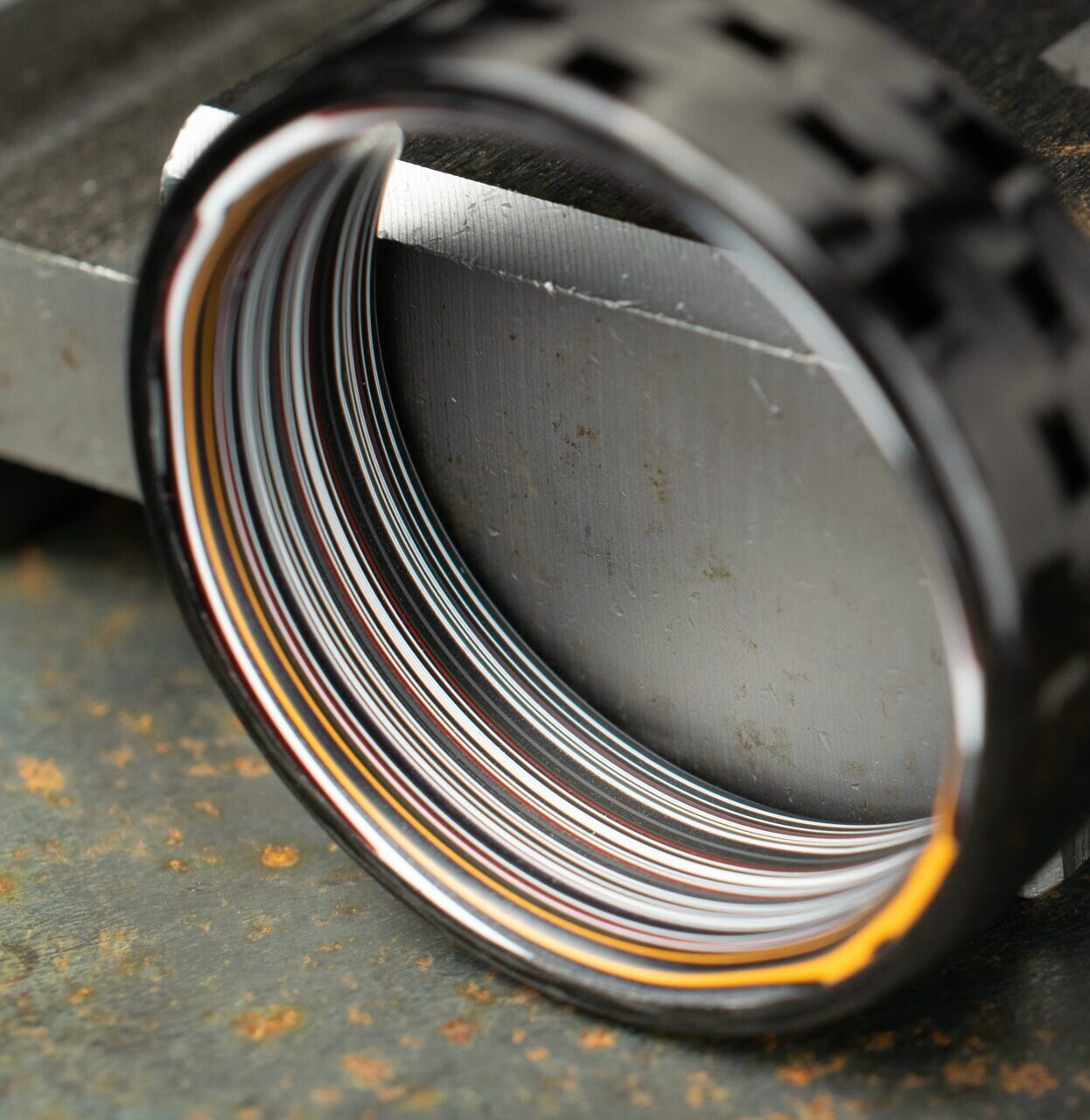 Men's Wedding Band. 5HS Carbon Fiber Ring Lined With Straight Cut Fordite. Gloss Finish Carbon Fiber. Black Ring.