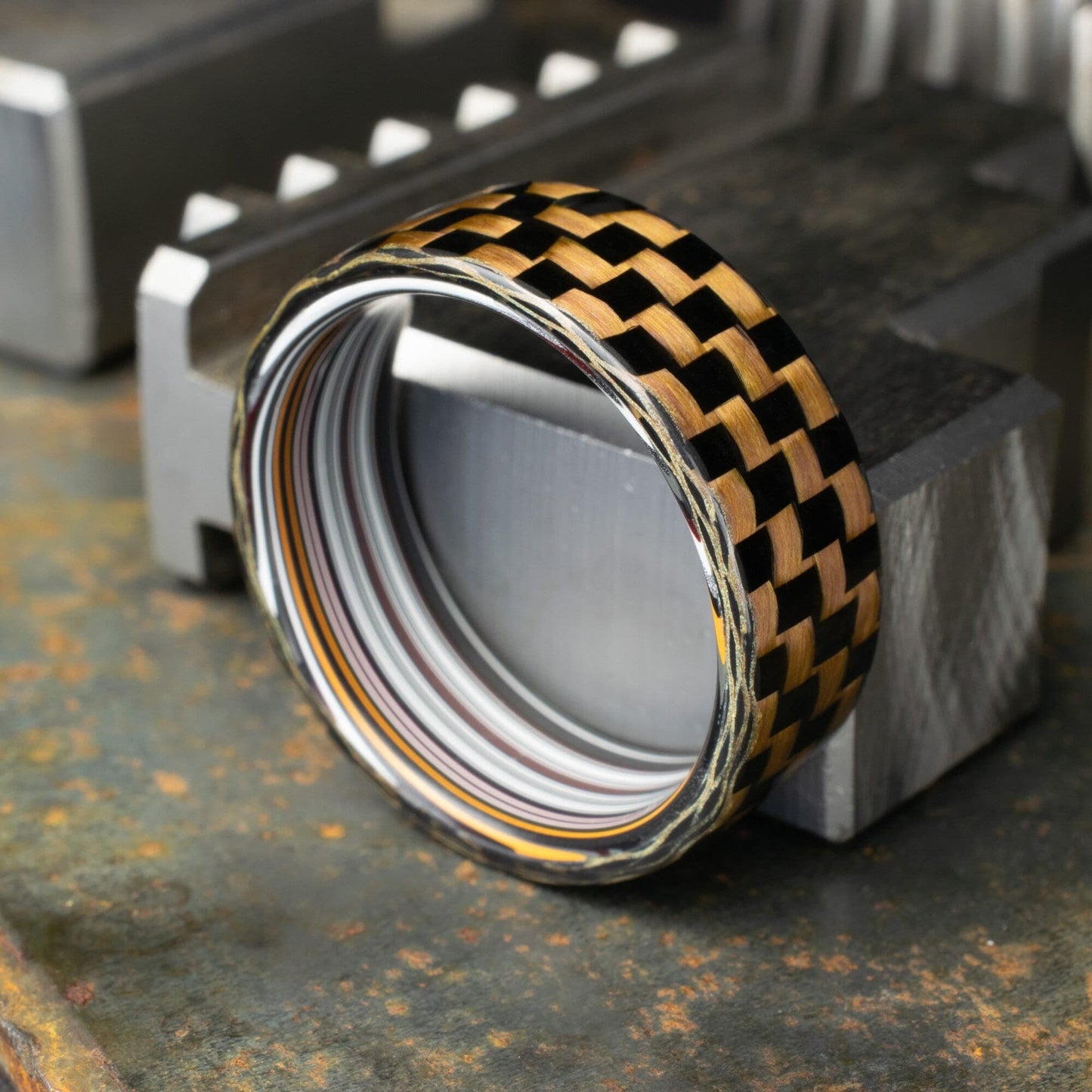 Checkered Zylon/Carbon Fiber Ring Lined With Straight Cut Fordite. Gloss Finish Zylon/Carbon Fiber. Men's Wedding Band.