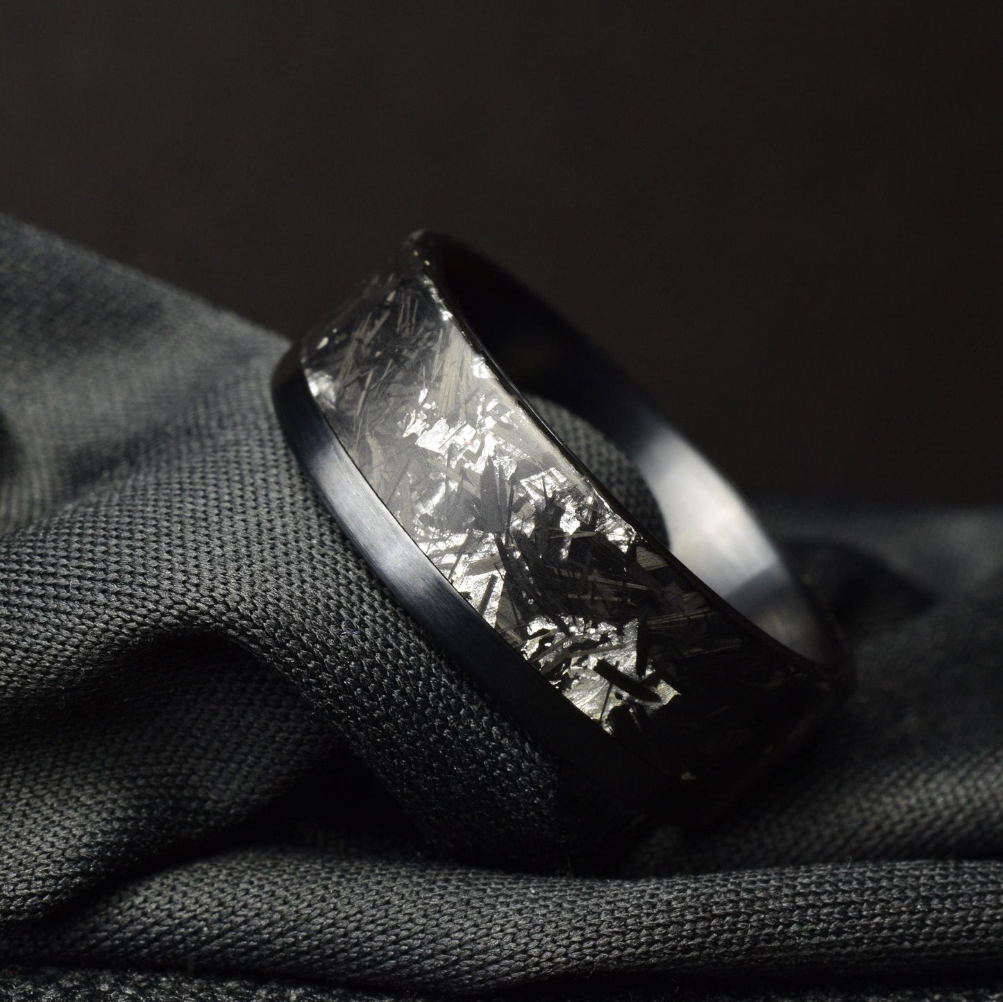 Matte Platinum Leaf Carbon Fiber Ring: Brushed Black Titanium Cuff.