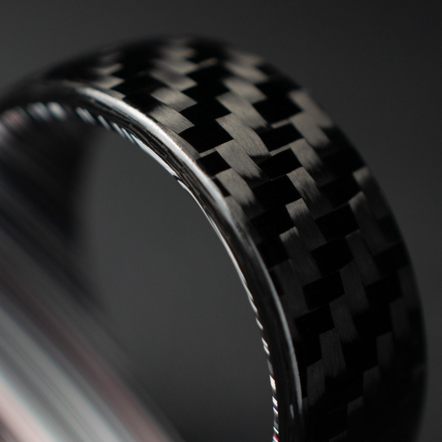 1k Twill Carbon Fiber Ring Lined With Tilted Fordite. Gloss Finish Carbon Fiber
